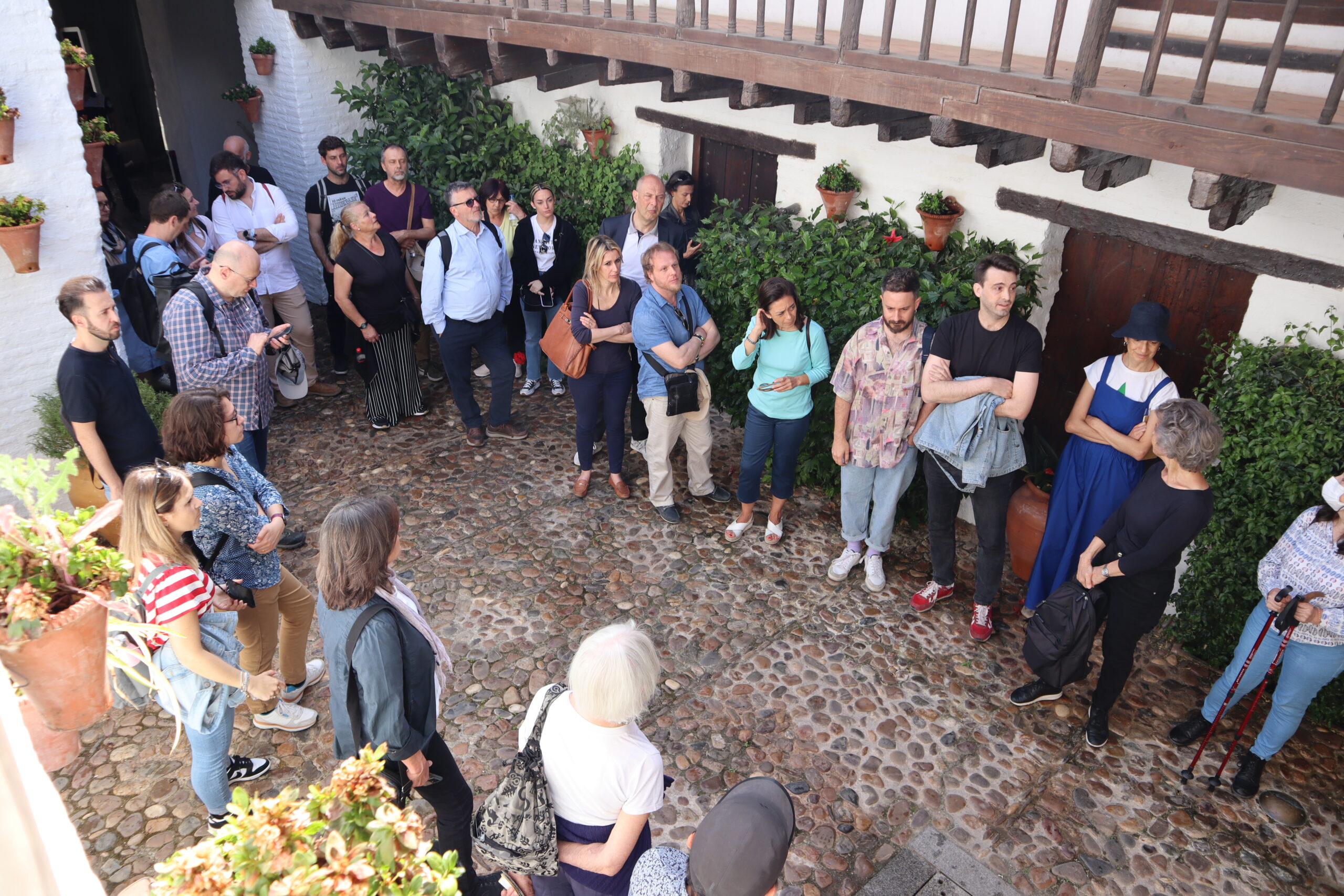Group of people in one of Cordoba courtyards